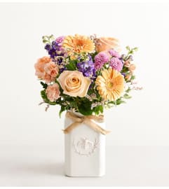 The Honey Bee Buzz™. An arrangement by Sicola's Florist.