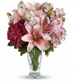 Teleflora's Blush Of Love Bouquet. An arrangement by Wasaga Flowers.