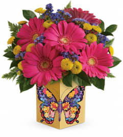 Teleflora's Wings Of Thanks Bouquet. An arrangement by Pompano Beach Floral.