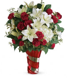 Teleflora's Work Of Heart Bouquet. An arrangement by Devine Orchid.