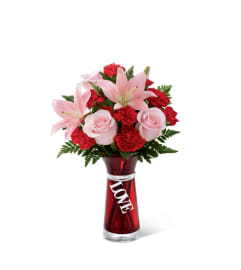 The FTD® Hold My Heart™ Bouquet 2015. An arrangement by Sandy's Florist.