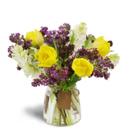 With Tulips on Top™. An arrangement by Hialeah Flowers.