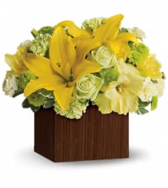 Teleflora's Smiles for Miles. An arrangement by Vivian Flowers.