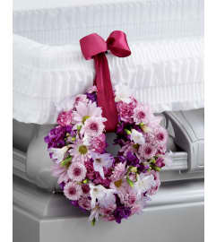 The FTD® Thoughts and Prayers™ Wreath. An arrangement by Mystic Garden Floral.