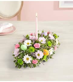Easter Centerpiece. An arrangement by Blessing and Blooms Florist.