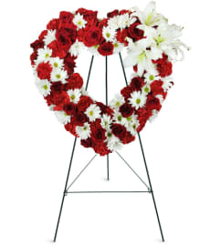 Rosy Remembrance Heart Wreath™. An arrangement by Abundant Flowers and Gift Shoppe.
