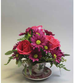 A Spot of Tea. An arrangement by Osborne Florist.