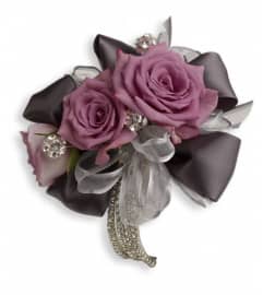 Roses And Ribbons Corsage. An arrangement by Devine Orchid.