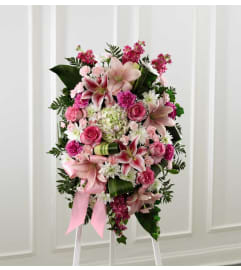 The FTD® Gently into the Ever-After™ Standing Spray. An arrangement by Mystic Garden Floral.