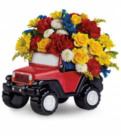 Jeep® Wrangler King Of The Road by Teleflora. An arrangement by Pompano Beach Floral.