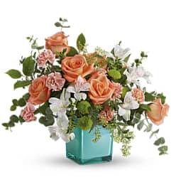 Sunset Splash Bouquet by Teleflora. An arrangement by Marivel's Florist and Gifts.