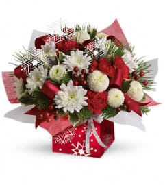 Teleflora's Winter Snowflake Present Perfect. An arrangement by My Bloomin Shop.