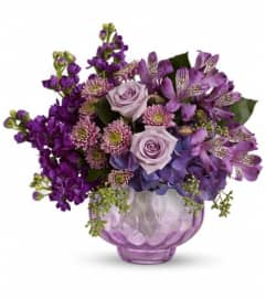 Teleflora's Lush and Lavender with Roses. An arrangement by GardeLina Flowers.