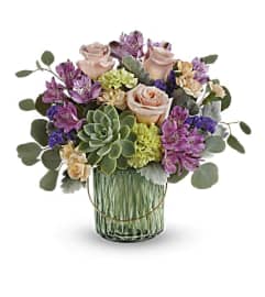 The Teleflora's Storybook Rose Bouquet. An arrangement by Marivel's Florist and Gifts.
