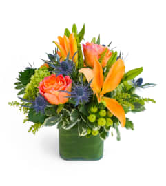 October Evening™. An arrangement by Flowers By Miss Bertha.
