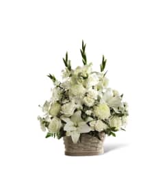 The FTD® Peaceful Passage™ Arrangement. An arrangement by Mystic Garden Floral.