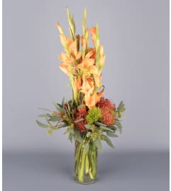 Hawaiian Dreamsicle. An arrangement by Floral Expressions and Gifts Inc..