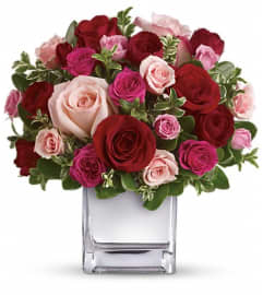 Teleflora's Love Medley Bouquet with Red Roses. An arrangement by Flowers By Maria.