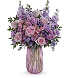 The Teleflora's Iridescent Delight Bouquet. An arrangement by Marivel's Florist and Gifts.
