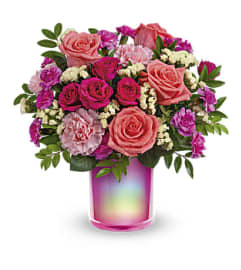Teleflora's Shimmering Beauty Bouquet. An arrangement by Marivel's Florist and Gifts.