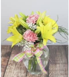 Blissful Blossoms. An arrangement by Rudy's Flower and Gift Shop.