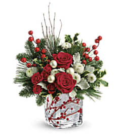 Teleflora's Winterberry Kisses Bouquet. An arrangement by Pompano Beach Floral.