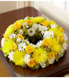 Cremation Wreath - Yellow and White. An arrangement by Graceland Florist.