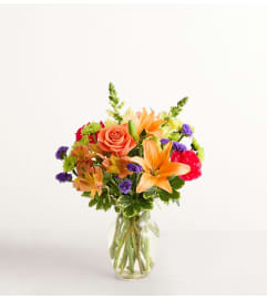 The Vibrant Floral Medley™. An arrangement by Graceland Florist.
