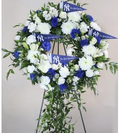 Yankee Funeral Wreathe. An arrangement by The Flower Boutique.