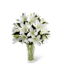 The FTD® Light In Your Honor™ Bouquet. An arrangement by Syd Kemsley Florist.