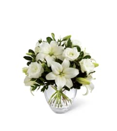 The FTD® White Elegance™ Bouquet. An arrangement by Mystic Garden Floral.