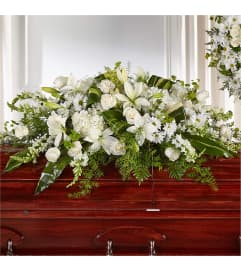 THE ABUNDANCE CASKET SPRAY. An arrangement by Syd Kemsley Florist.