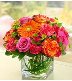 Sunset Passion™ 2014. An arrangement by Graceland Florist.