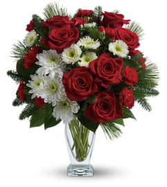 Teleflora's Winter Kisses Bouquet. An arrangement by Pompano Beach Floral.