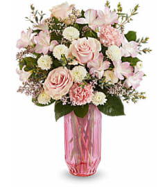 The Teleflora's Chérie Bloom Bouquet. An arrangement by Marivel's Florist and Gifts.