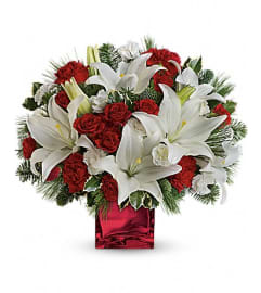 Colour in the Snow. An arrangement by Top Flower Designers.