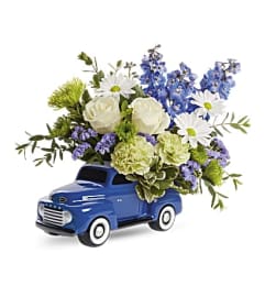 Teleflora's Enjoy the Ford Bouquet. An arrangement by Marivel's Florist and Gifts.