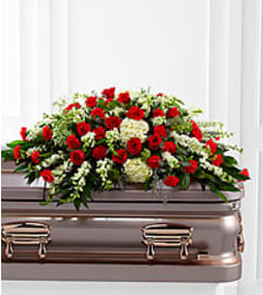 serenity casket spray. An arrangement by Fine's Flowers.