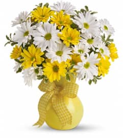 Teleflora's Upsy Daisy. An arrangement by Flower Trends Florists.