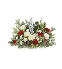 The Teleflora's Heavenly Peace Bouquet. An arrangement by Marivel's Florist and Gifts.