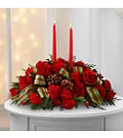 classic candles. An arrangement by Fine's Flowers.