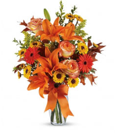 Burst of Autumn. An arrangement by White's Flowers.