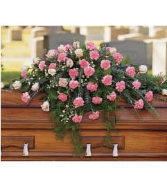 Heavenly Pink Casket Spray. An arrangement by The Flower Boutique.