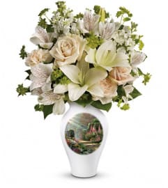 Thomas Kinkade's Radiant Garden by Teleflora. An arrangement by Devine Orchid.