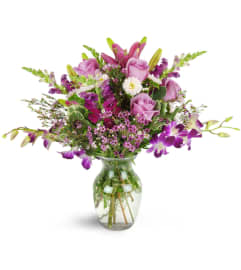 Purple Paradise Orchid Bouquet™. An arrangement by Hialeah Flowers.