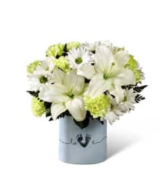 The FTD® Tiny Miracle™ New Baby Boy Bouquet. An arrangement by Sandy's Florist.
