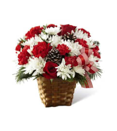 The FTD® Holiday Happiness™ Basket. An arrangement by Flamingo Floral and Gifts.