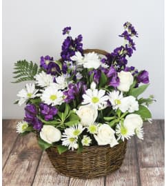 Shades of a Moonlight Sky. An arrangement by Pike Creek Flower and Gift Shoppe.