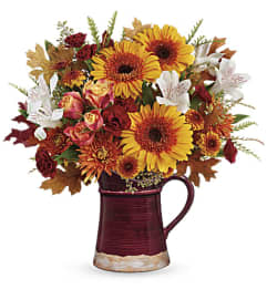 Teleflora's Blooming Fall Bouquet. An arrangement by White's Flowers.