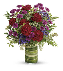 The Teleflora's Vivid Love Bouquet. An arrangement by Marivel's Florist and Gifts.